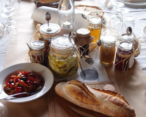 The table was overflowing with local cheeses, home made breads, preserves and relishes