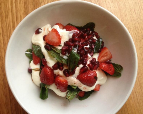 Strawberry salad with mint, rosewater, yoghurt and pomegranate pearls